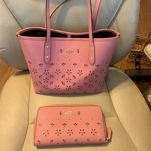 Coach purse and matching zip around wallet.